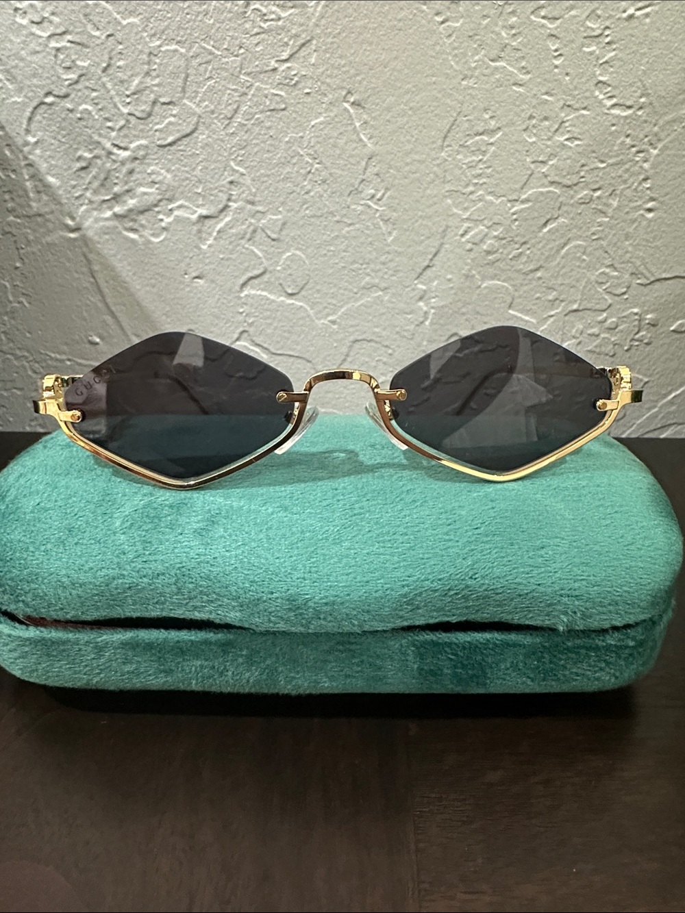 Gucci Gold Rimless Sunglasses with Black Lenses